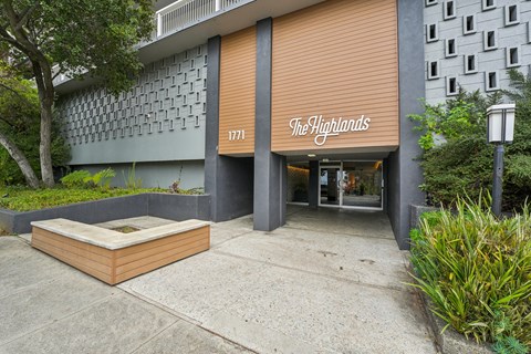 the facade or entrance of the highlands condominiums